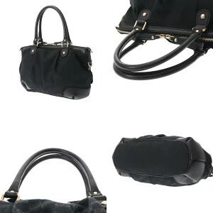 Gucci leather handbag GG black canvas bag